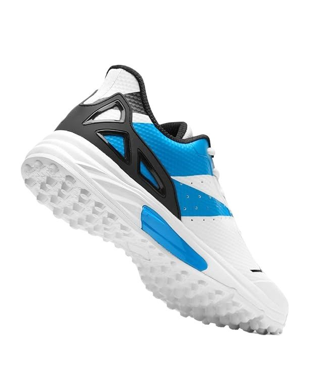 A white and blue athletic shoe, branded "HS," prominently displayed on the side, designed as the Jazba Skydrive 290. These cricket shoes feature synthetic materials with blue accents and black details on the tongue and heel area, offering excellent traction. The sneakers boast a sleek and modern design.
