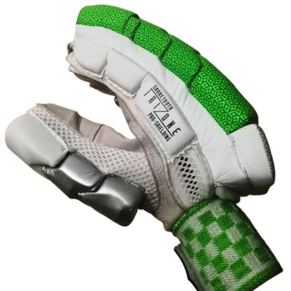 The Gray Nicolls Vapour 1500 Green - Master Replica batting gloves feature a white and silver color scheme with striking green accents. The back of these cricket gloves showcases a textured green pattern, and the label proudly displays "Gray Nicolls," "1500," along with a distinctive red and white cross design for superior impact protection.