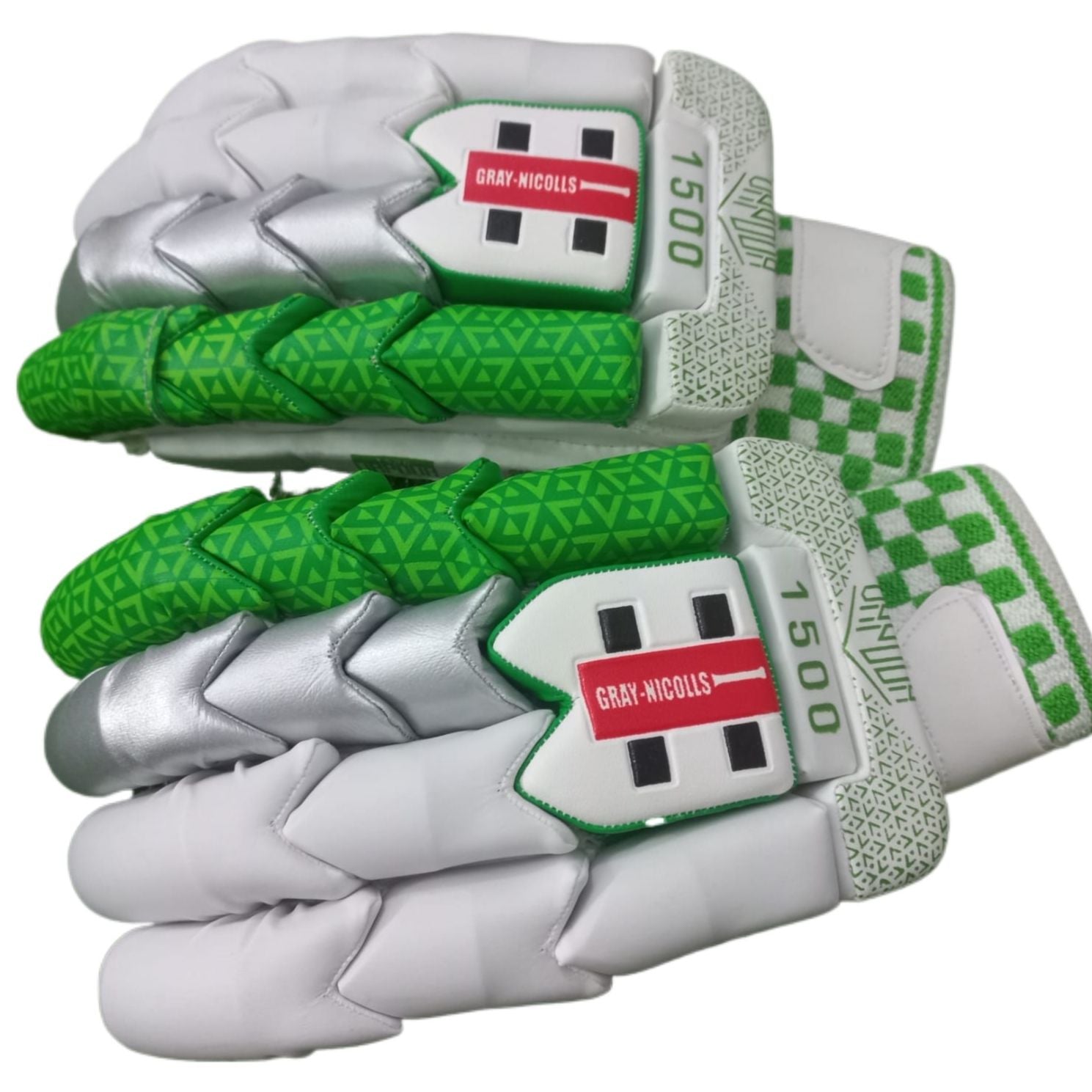 The Gray Nicolls Vapour 1500 Green - Master Replica batting gloves feature a white and silver color scheme with striking green accents. The back of these cricket gloves showcases a textured green pattern, and the label proudly displays "Gray Nicolls," "1500," along with a distinctive red and white cross design for superior impact protection.