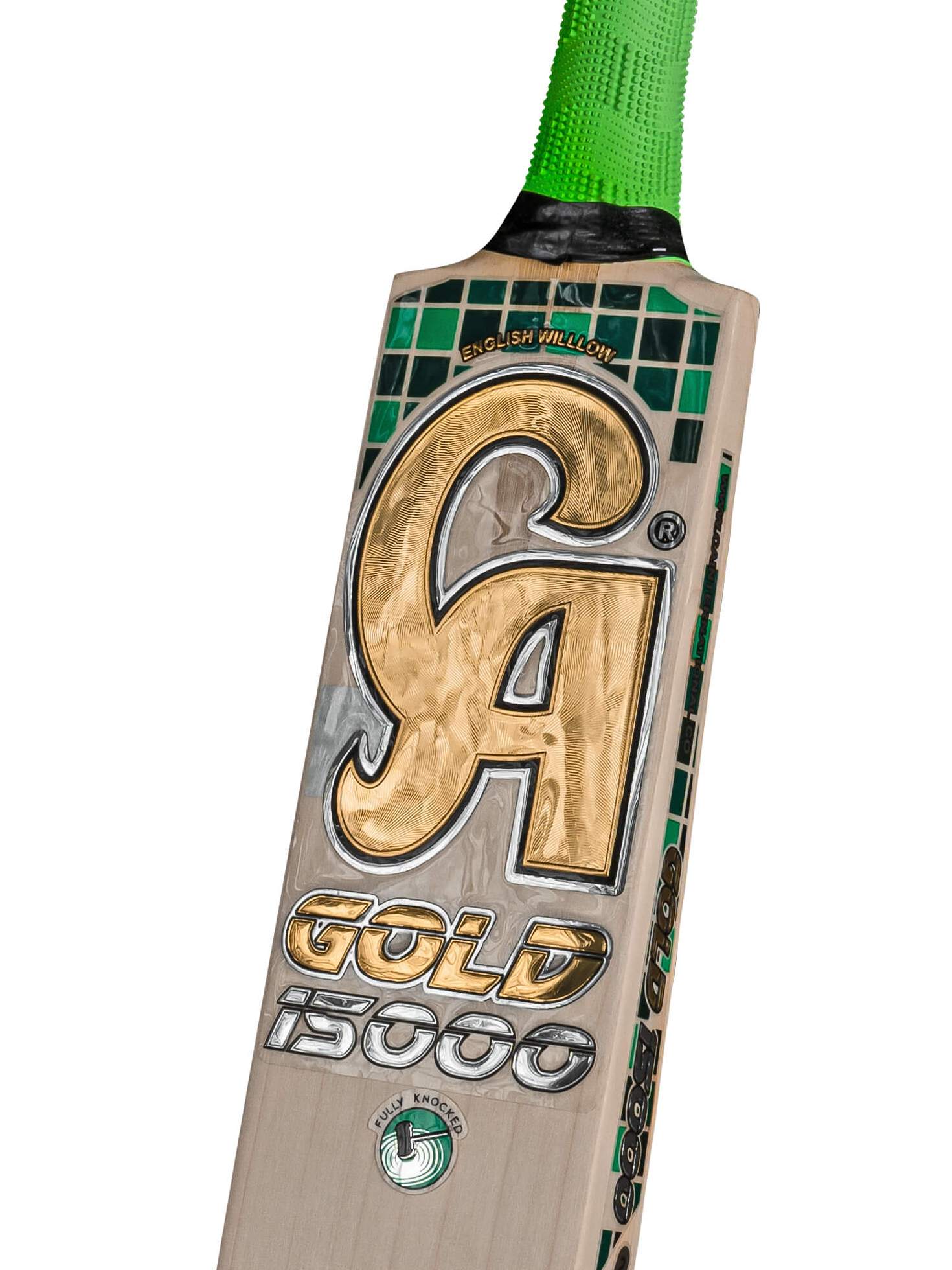 A CA Gold 15000 - Professional Standard Pro Grade English Willow cricket bat featuring a light wooden blade and a bright green handle. The front of the bat displays "CA Gold 15000" in bold, gold lettering, while the top of the blade showcases a small green and black pattern. Crafted from premium materials for superior performance.