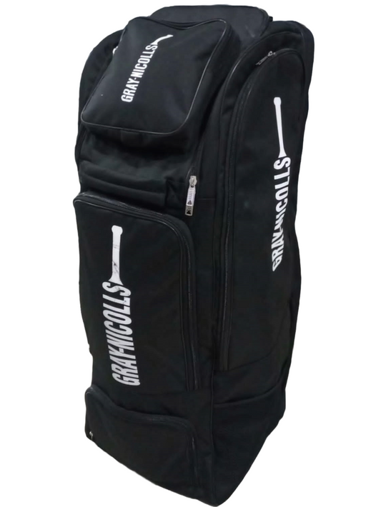 Introducing the Gray Nicolls Black Duffel - Master Replica, an upright and spacious bag crafted from durable Codura Nylon. This duffel features multiple compartments and zippers, emblazoned with the "Gray-Nicolls" brand name and a white cricket bat logo, making it the perfect companion for carrying all your cricket equipment.